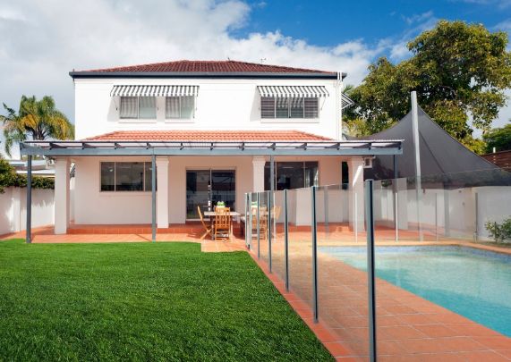Cozy modern home with glass pool enclosure | Dandenong Fencing Pros